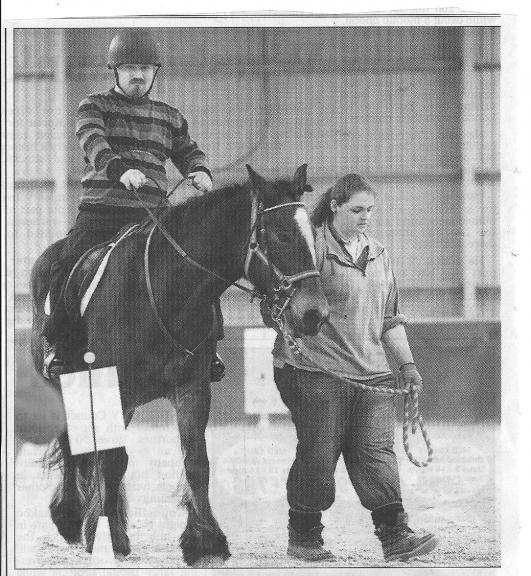 Neil riding in competition on Candy